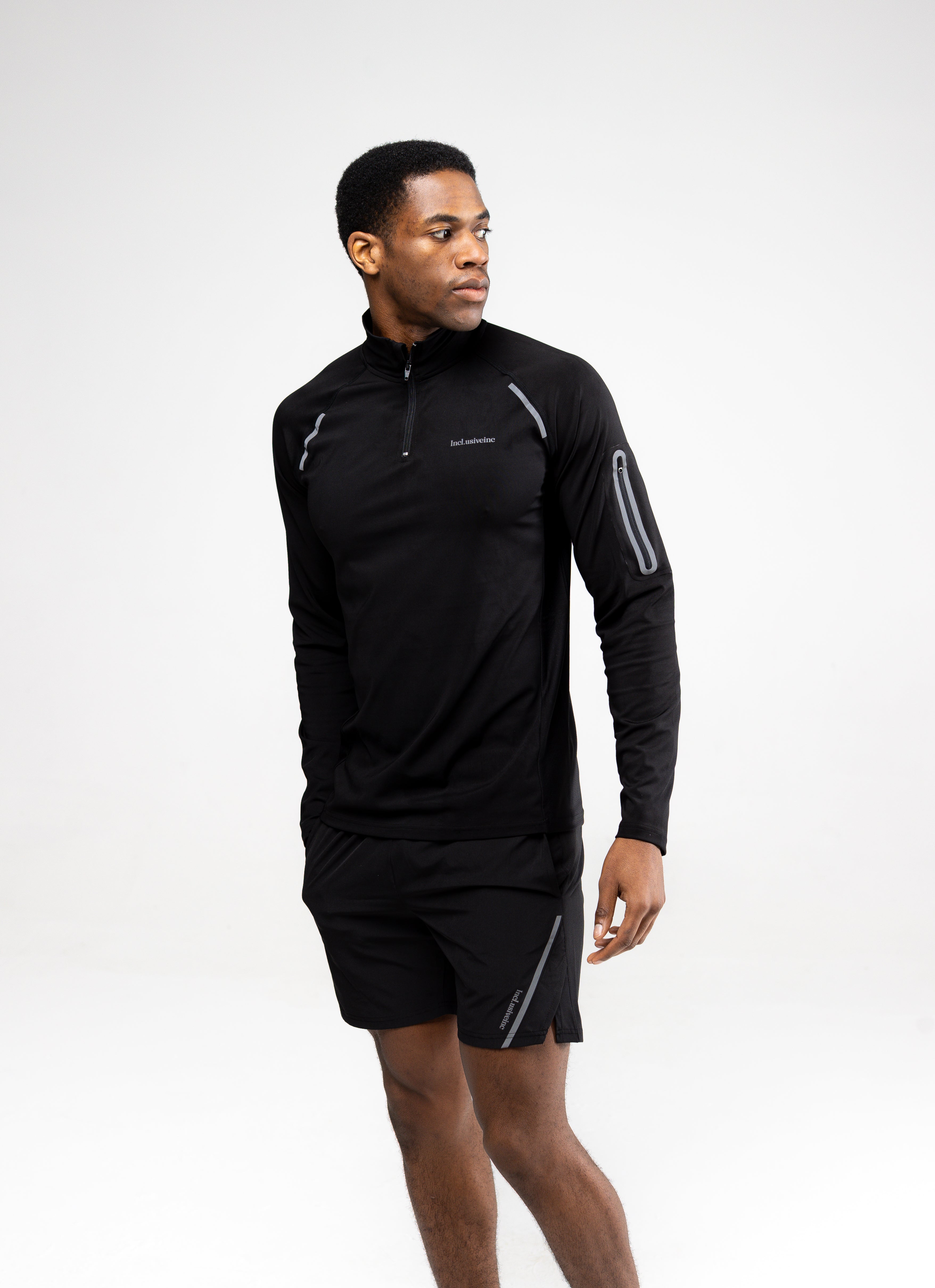 Black men’s zip long sleeve training top 
